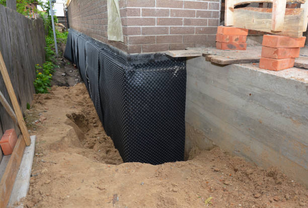 SJ Waterproofing Pros technician performing targeted Exterior Waterproofing assessment in Montclair, NJ
